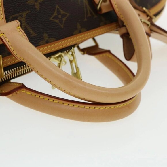 LOUIS VUITTON Monogram Alma Voyage GM Boston Bag - Picture 7 of 16